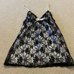 Victoria’s Secret black/white lacey teddy. Size S.